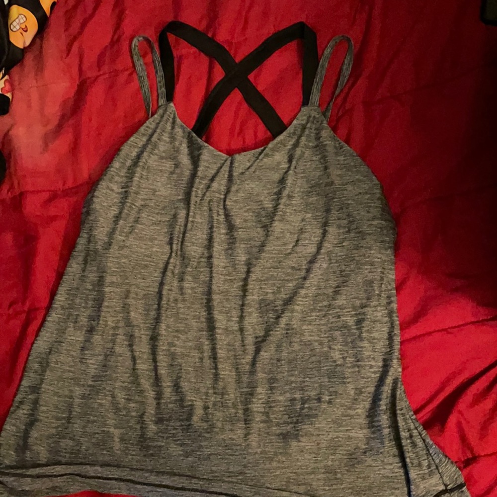 Strap gym shirt with bra layer included. L/G 12-14